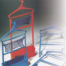 clothes racks with clothes hangers and keyboards